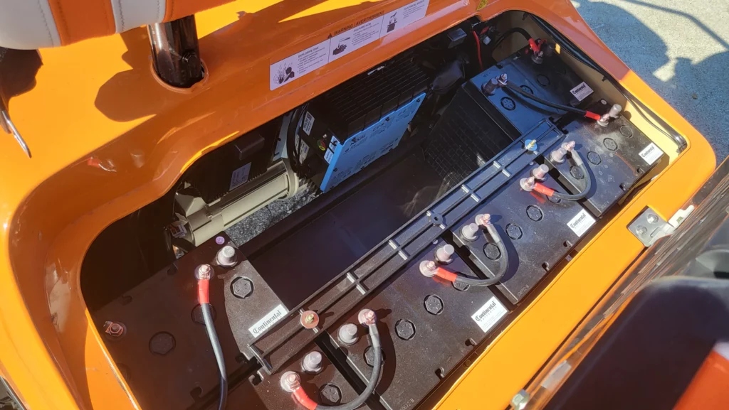 can you power wash golf cart batteries