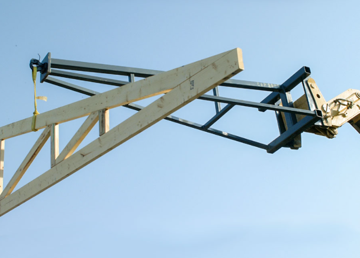 what is a reach forklift truss boom used for