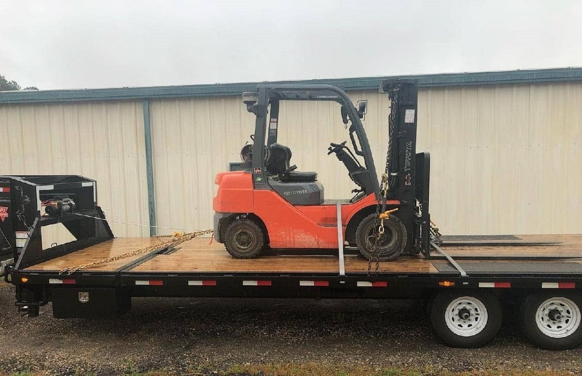 how to secure a forklift for transport