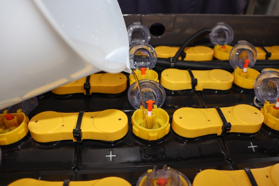 how to put water in a wet cell forklift battery