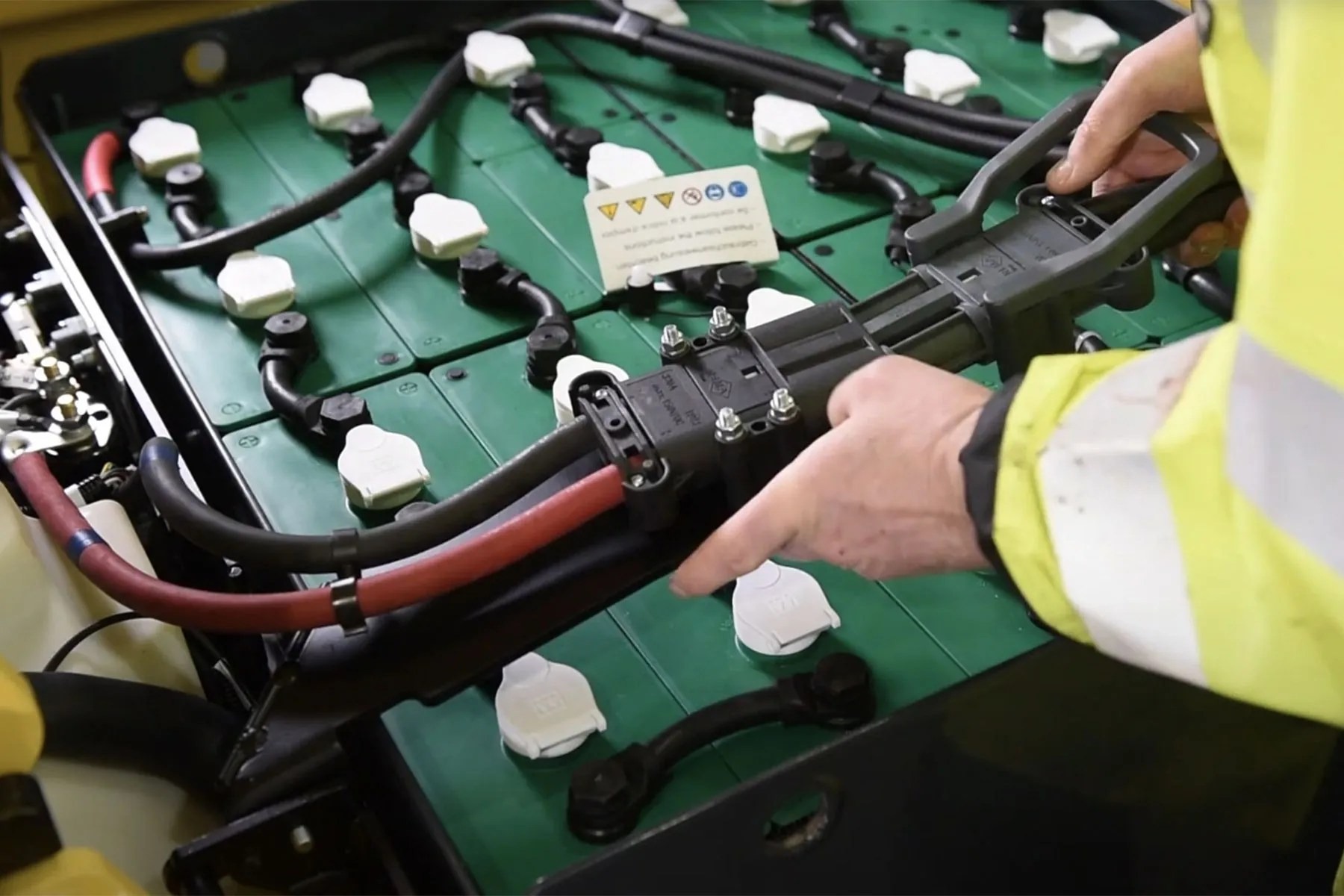 how to raise specific gravity in a forklift battery