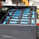 how to raise specific in a forklift battery